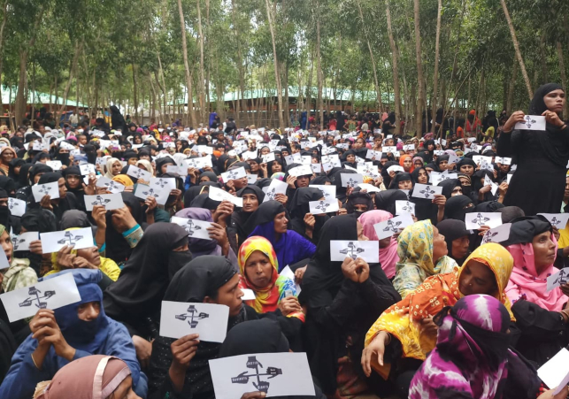 Rohingya Refugees with Banner